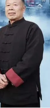 Gu Tidong stands in a dark traditional jacket against a misty mountain backdrop.